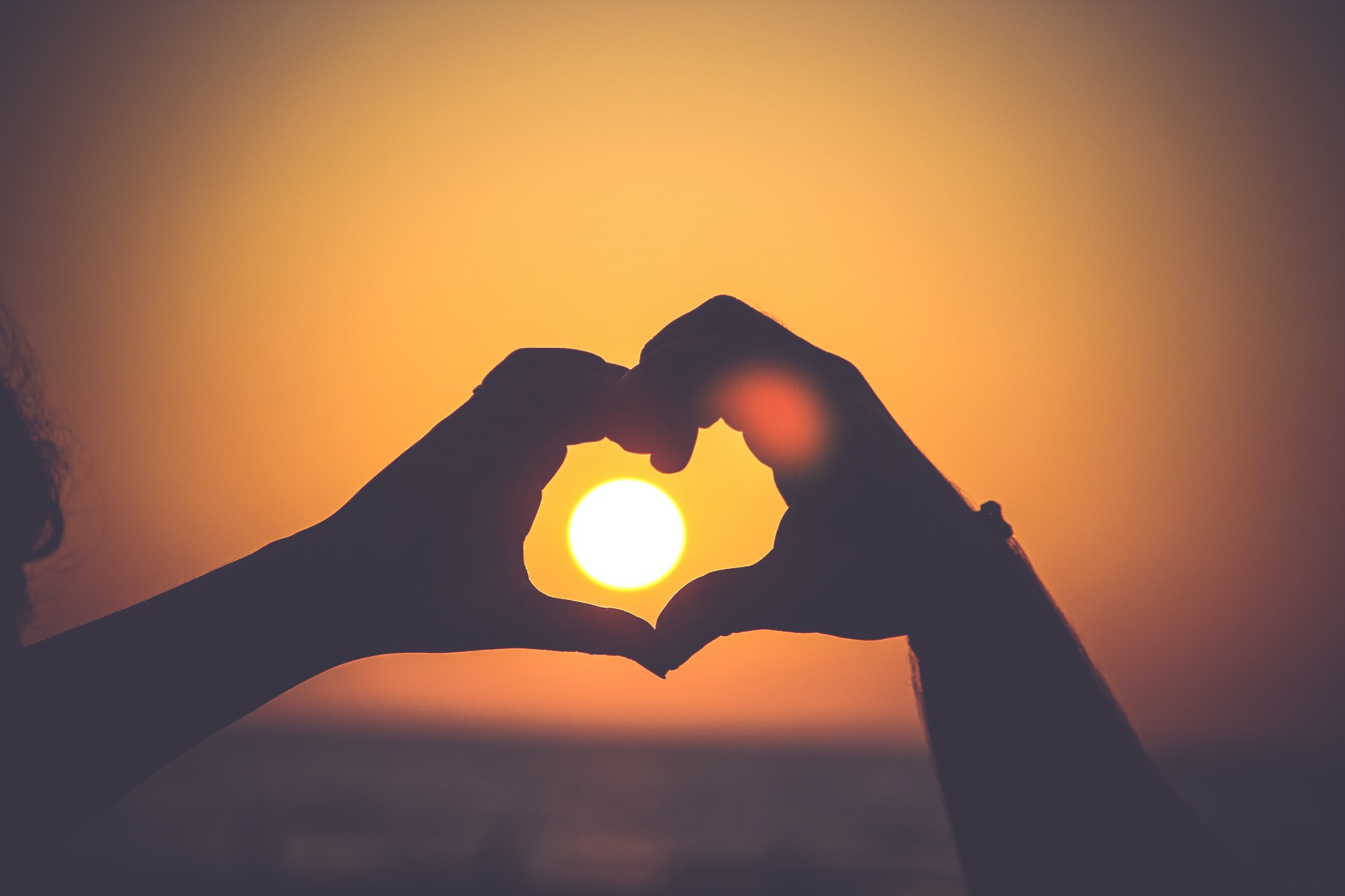 women-hand-with-sun.jpg